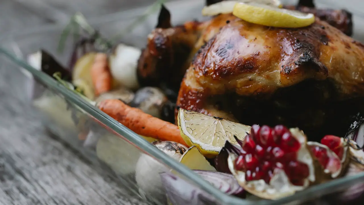 Roasted chicken with vegetables in a baking dish