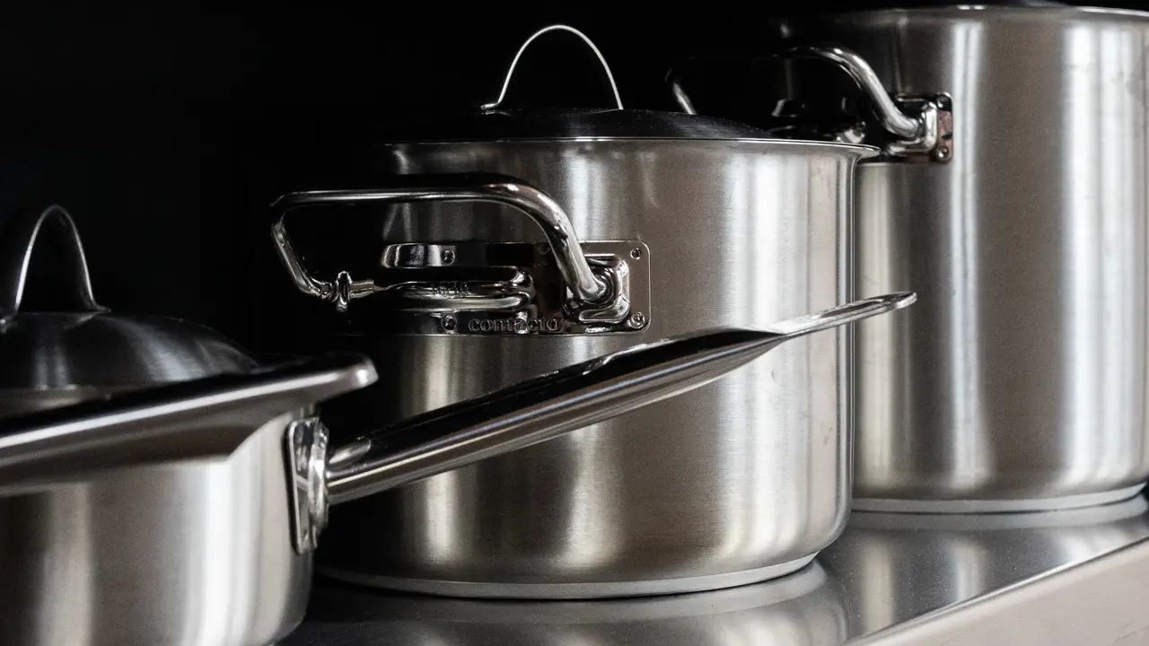 A stack of lidded stainless pots